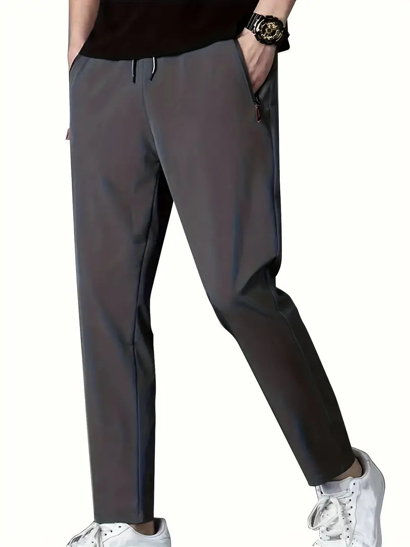 Men's gray casual drawstring joggers with classic tapered silhouette for all-day comfort