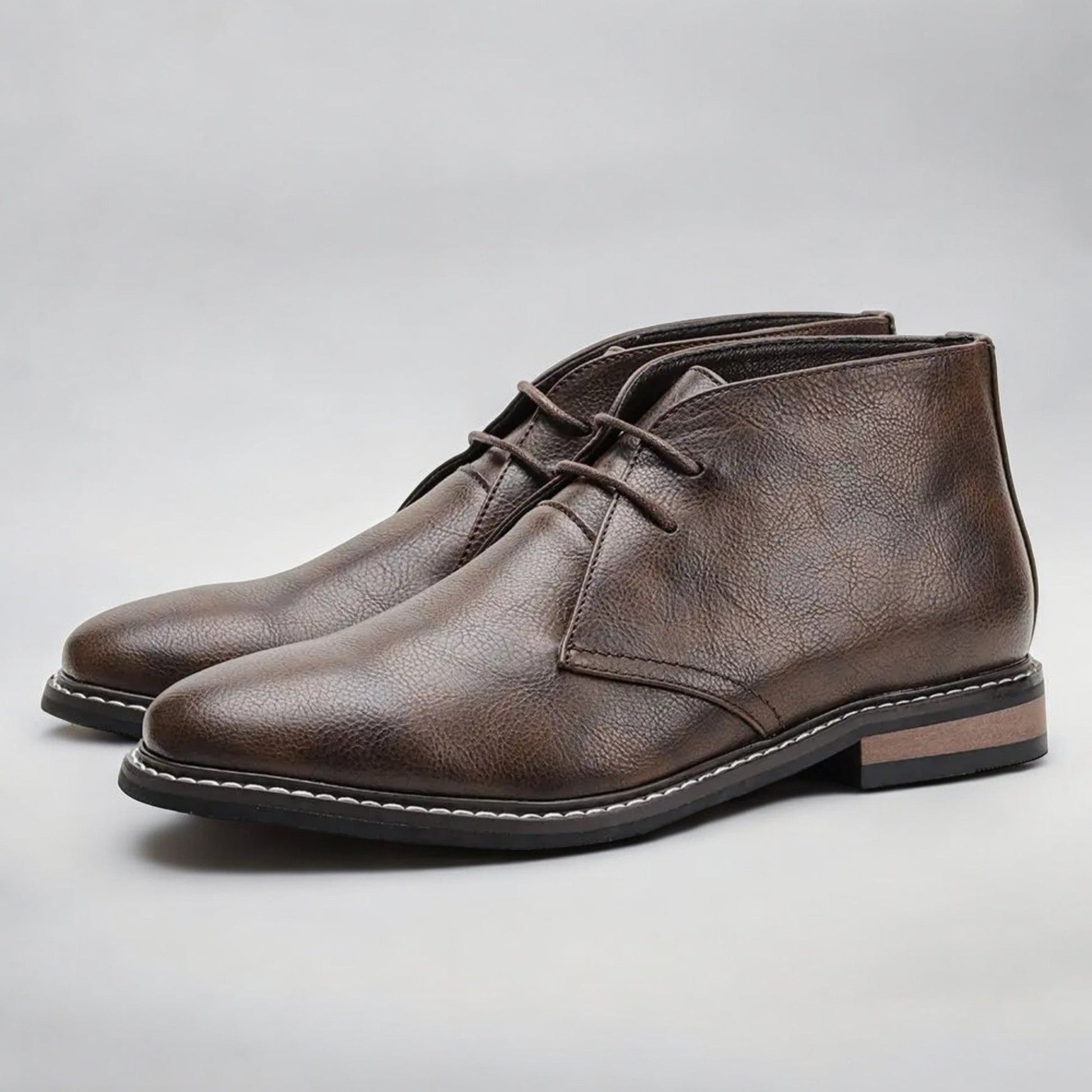 Men's genuine leather chukka boots in classic brown, ankle-height silhouette with loafer-inspired design