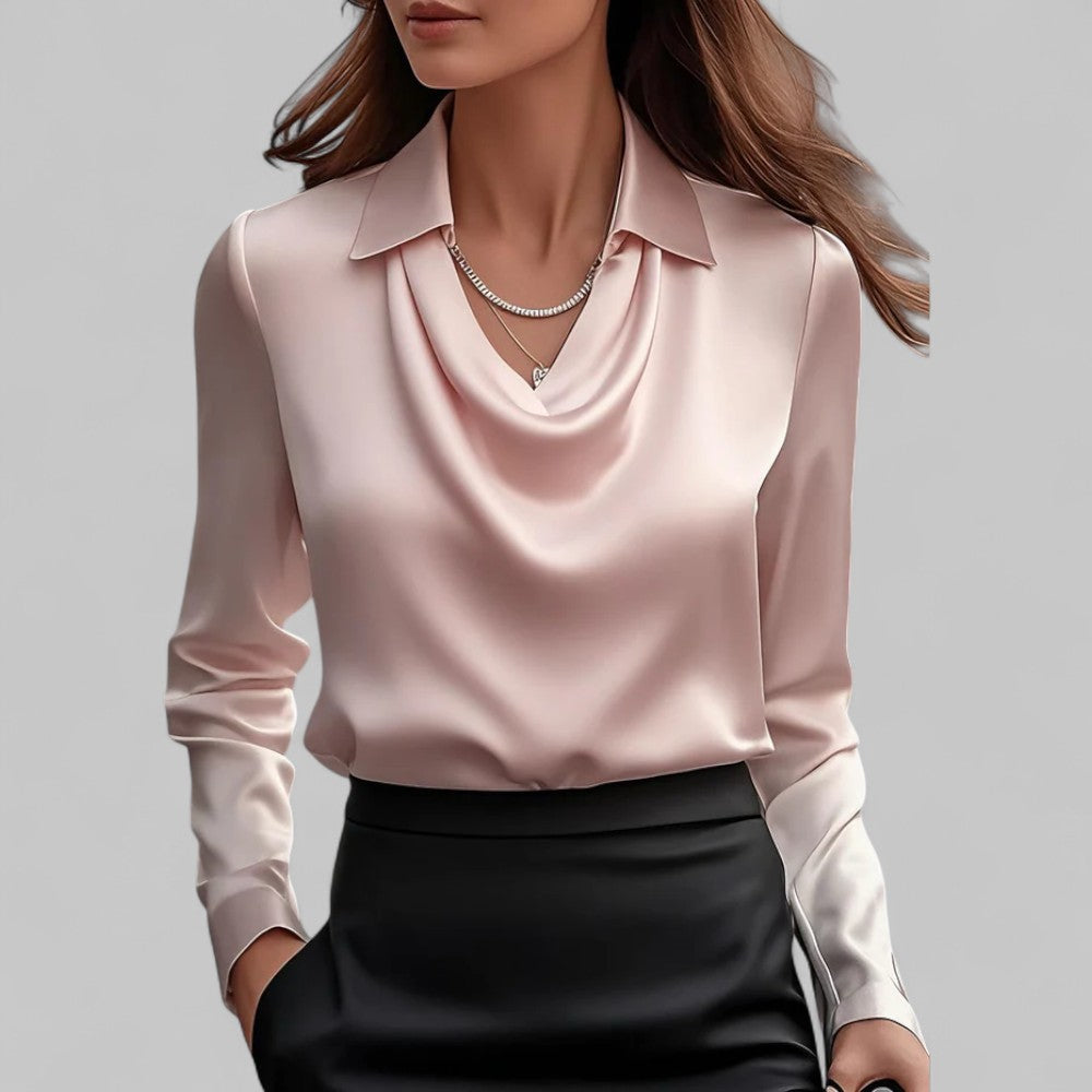 Women's ivory satin blouse with draped silhouette, structured collar, and light-catching fluid fabric