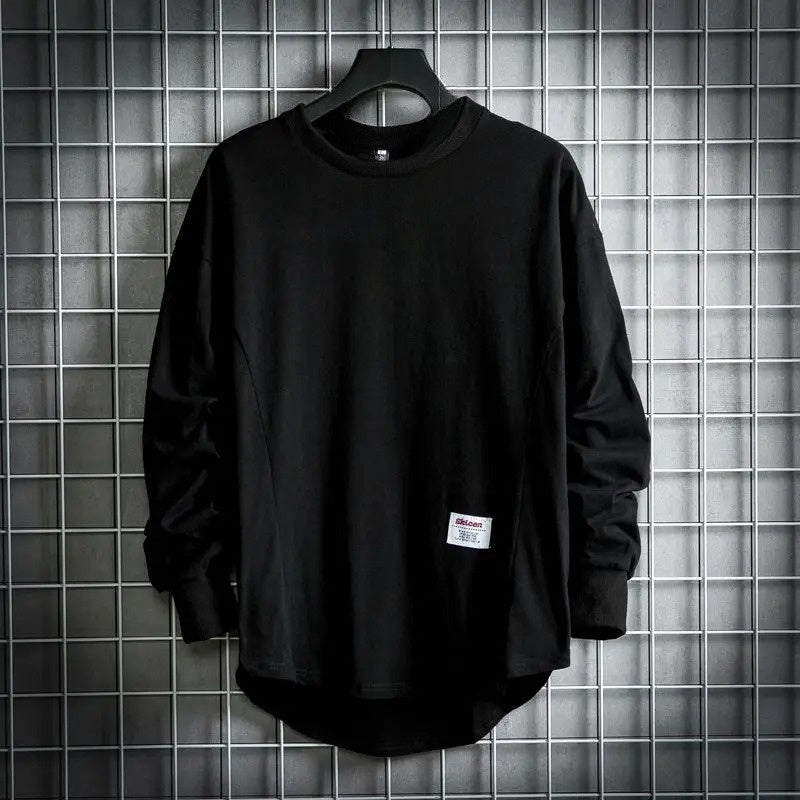 Oversized beige cotton crewneck pullover with drop hem, relaxed silhouette for everyday layering