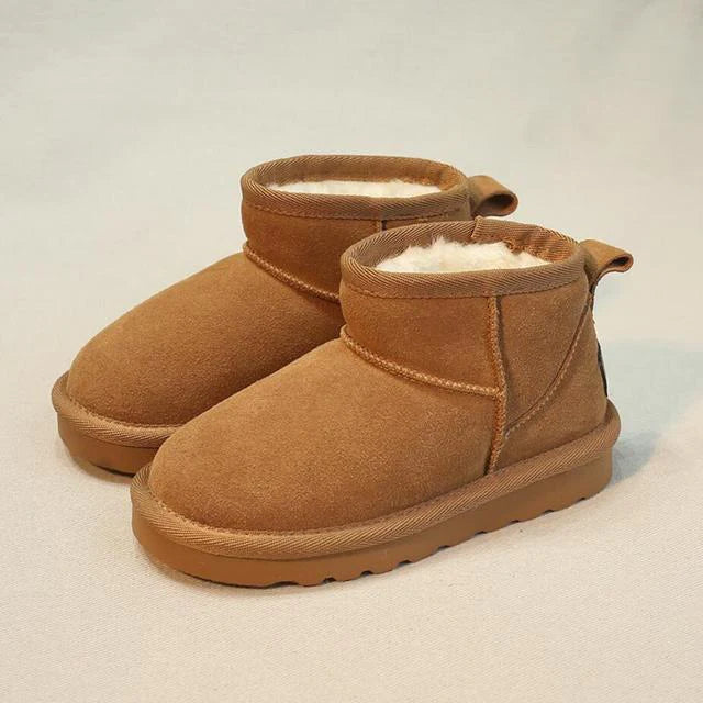 Women's genuine suede ankle boots with warm lining, timeless elegant style, and non-slip rubber sole