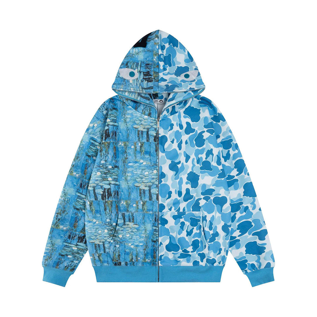 Full-zip streetwear hoodie split camo and digital art print panels with mirrored hood eye graphics
