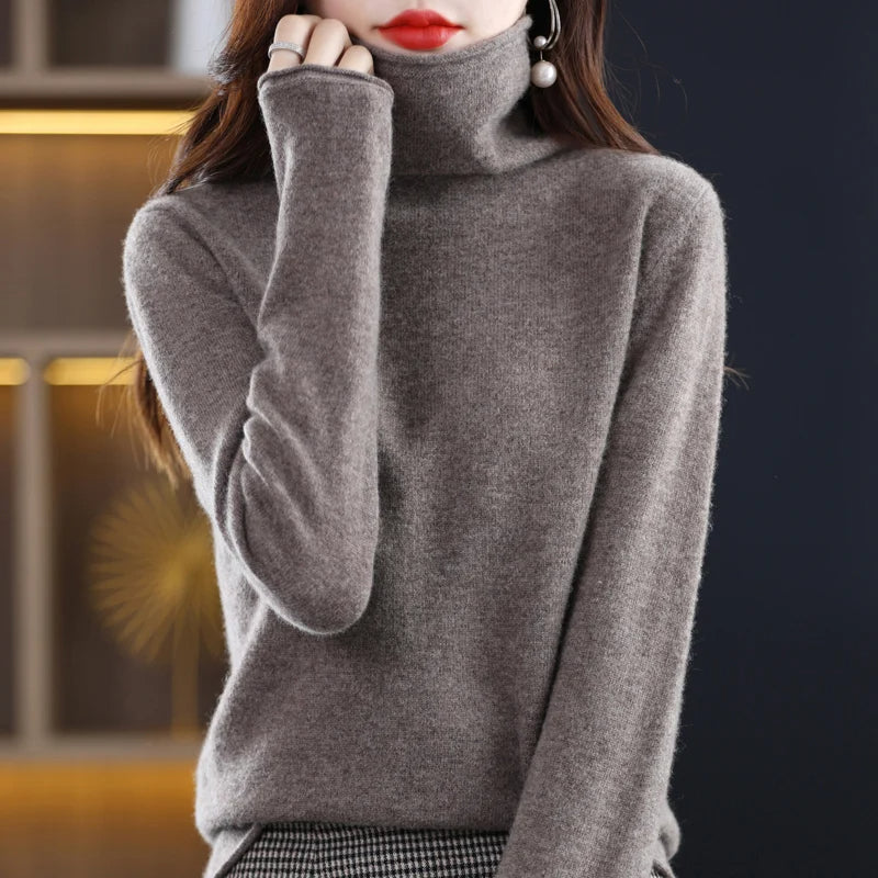 Women's regular-fit knit sweater in neutral tone, cozy elegant design with timeless silhouette