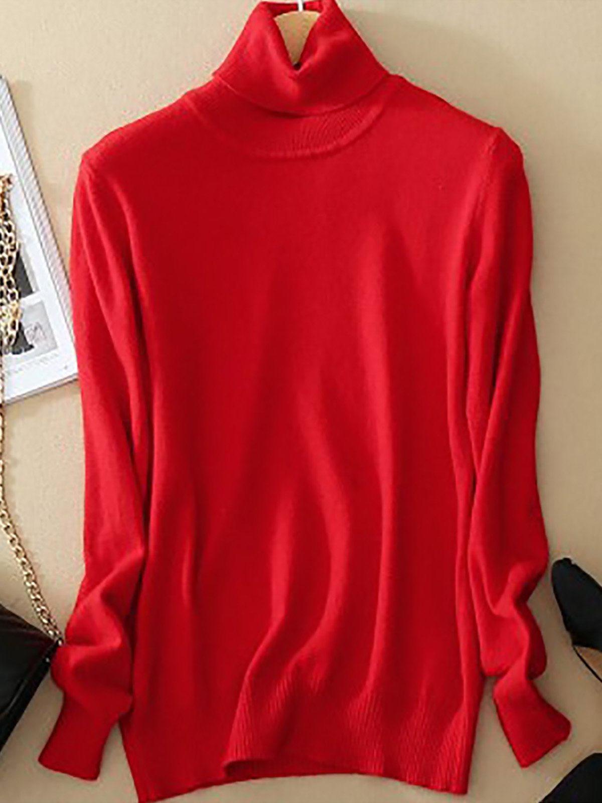 Women's slim-fit premium turtleneck sweater in neutral tone with sleek minimalist silhouette