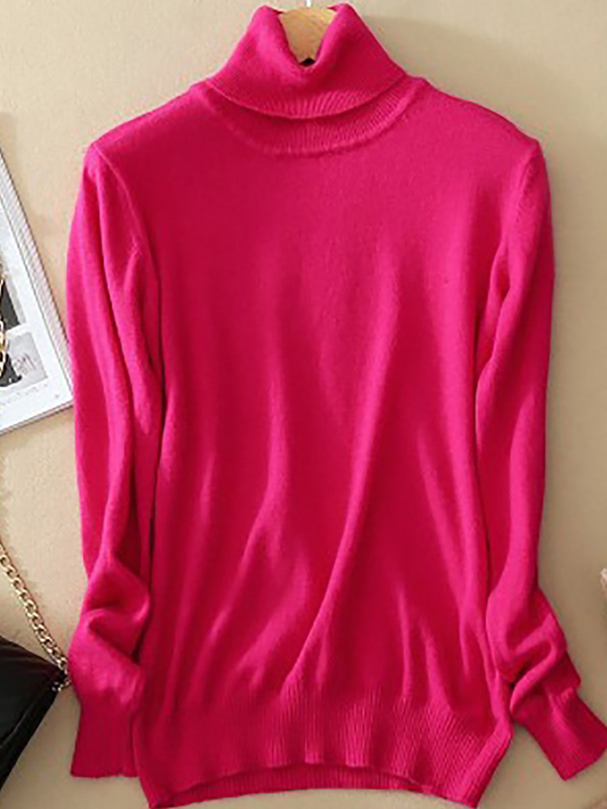 Women's slim-fit premium turtleneck sweater in neutral tone with sleek minimalist silhouette for layering
