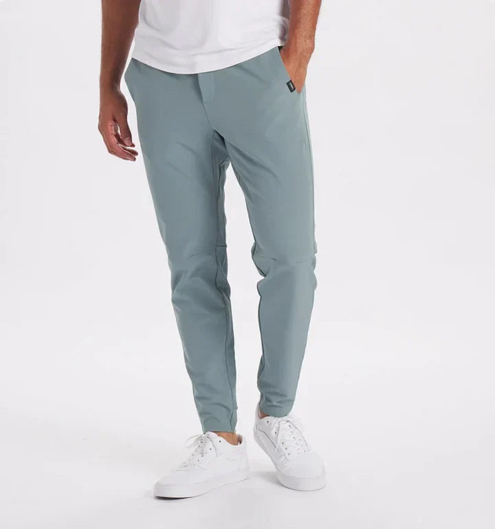 Men's slim-fit suit trousers in neutral tone with flexible waistband for all-day professional comfort