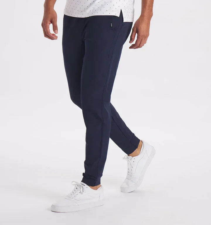 Men's slim-fit suit trousers in classic neutral tone with flexible comfort waistband for professionals