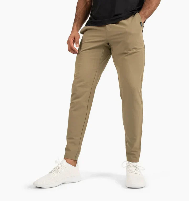 Men's slim-fit suit trousers in classic neutral tone with flexible waistband for all-day comfort