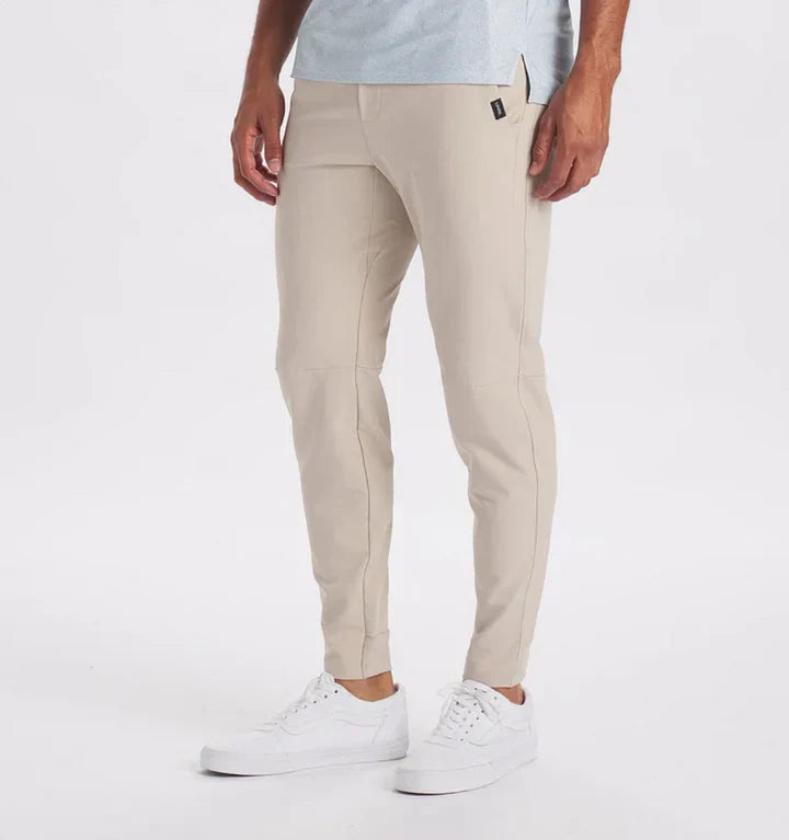 Men's slim-fit suit trousers in classic neutral tone with flexible waistband for all-day comfort