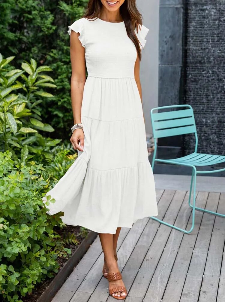 Women's lightweight summer dress with ruffle accents, functional pockets, sustainable fabric, versatile style