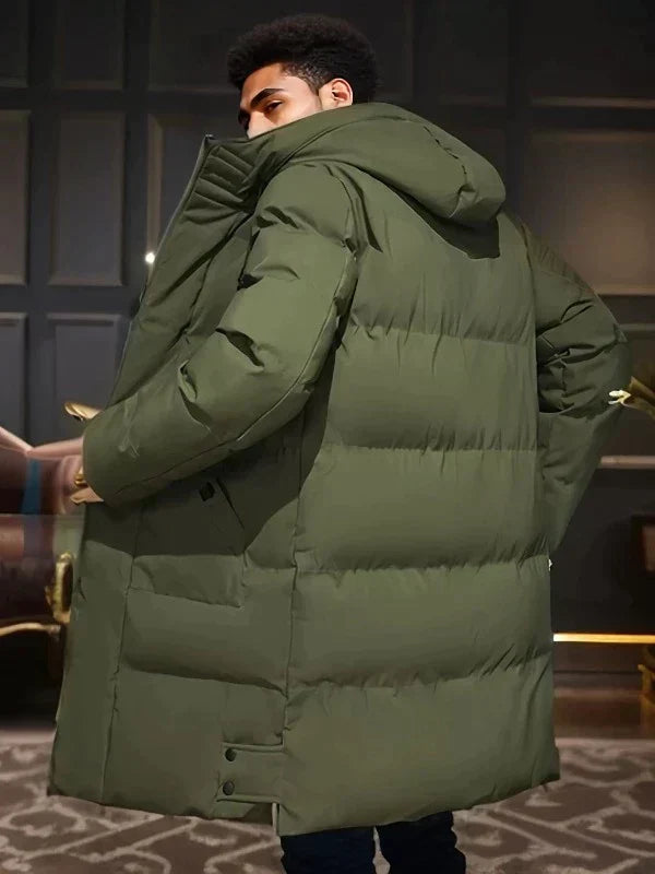 Men's black long quilted waterproof parka with elegant urban silhouette and refined winter styling