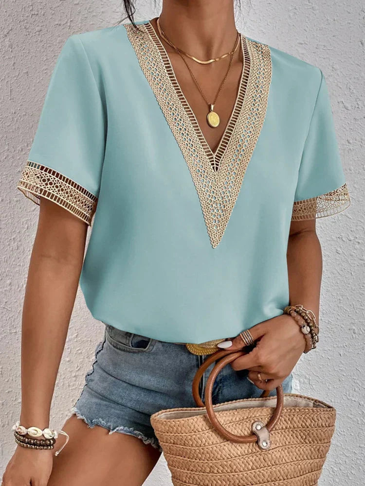 Women's soft white V-neck shirt relaxed summer fit with elegant neckline detail