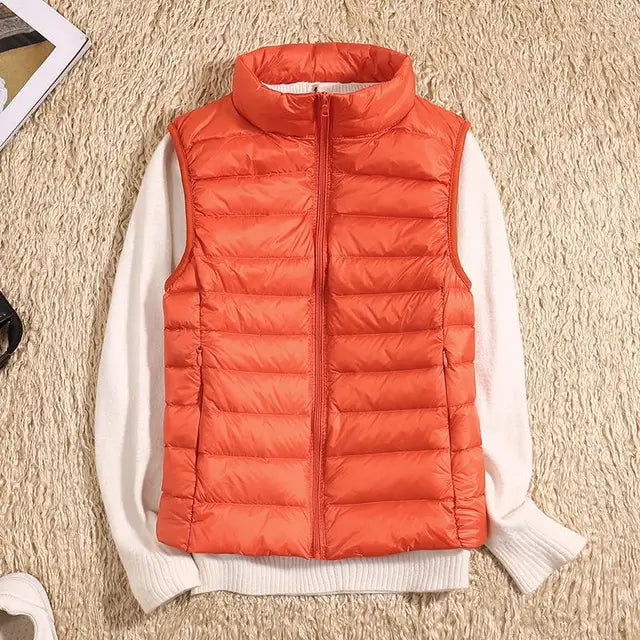 Women's ultralight down jacket slim fitted silhouette feather-light warmth versatile layering essential