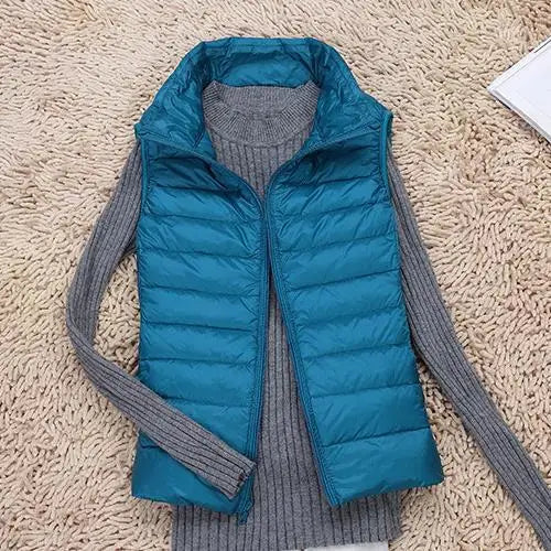 Women's ultralight down jacket slim fit feather-light silhouette versatile layering essential