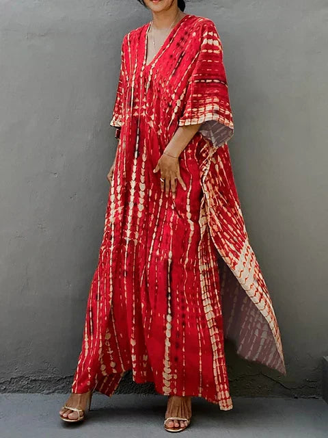 Women's boho tie-dye caftan maxi dress, V-neck loose fit with vibrant batik print for beach resort