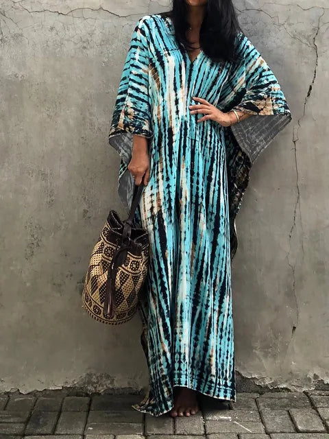 Women's boho tie-dye caftan maxi dress, V-neck loose fit with vibrant batik print for beach style
