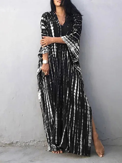 Women's boho tie-dye caftan maxi dress, V-neck loose fit with vibrant batik print for beach & resort