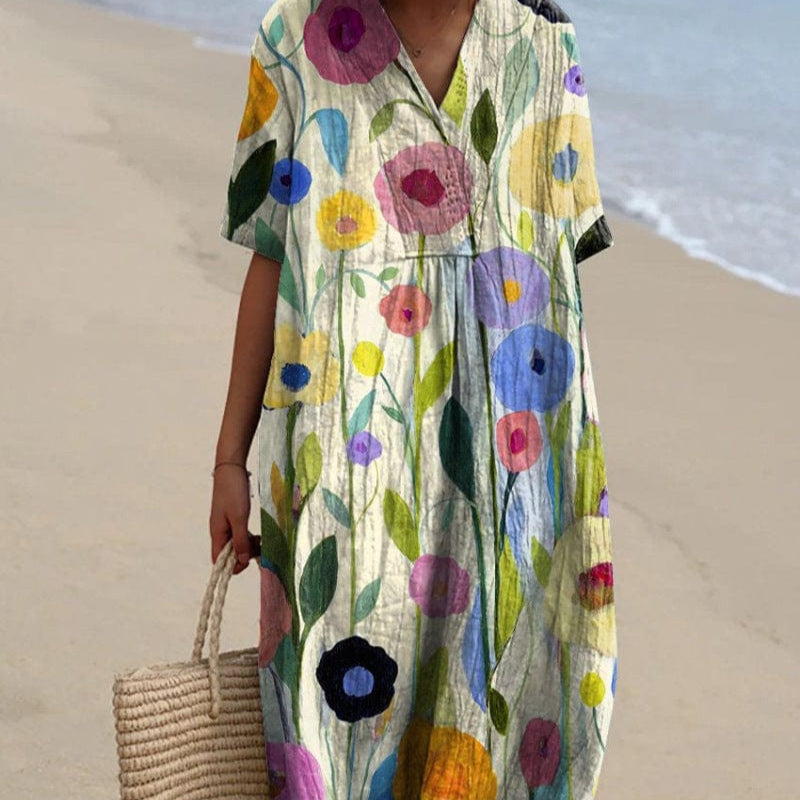Women's floral summer dress, lightweight airy fit, multicolored print, beach-ready elegant style