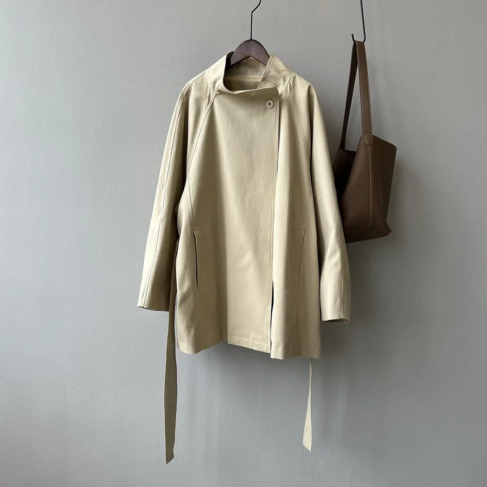 Women's beige belted trench coat stand collar relaxed modern fit detachable tie waist
