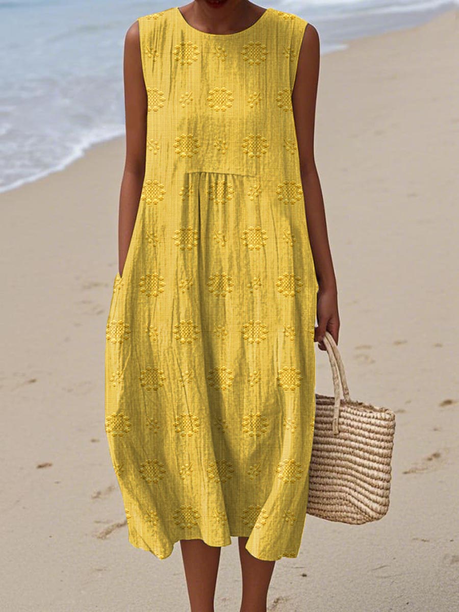 Women's textured midi dress with gathered waist, sleeveless breezy silhouette in circular print