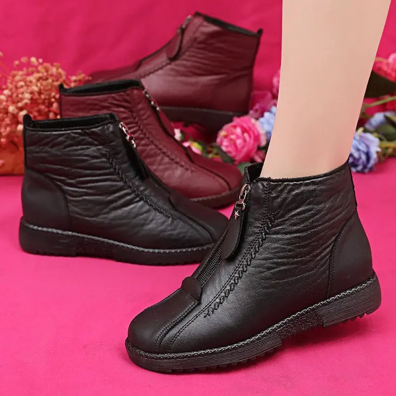 Women's fur-lined zip ankle boots cozy minimal silhouette warm soft interior cold-weather