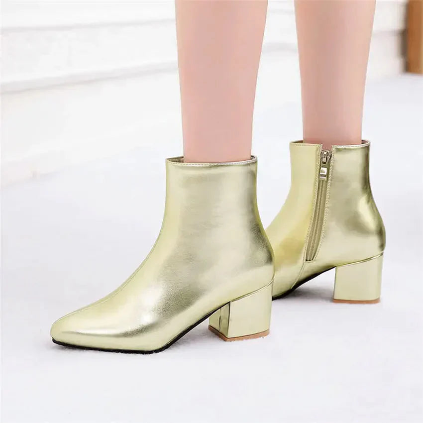 Women's shiny metallic silver zip-up ankle boots with insulated warm lining for winter