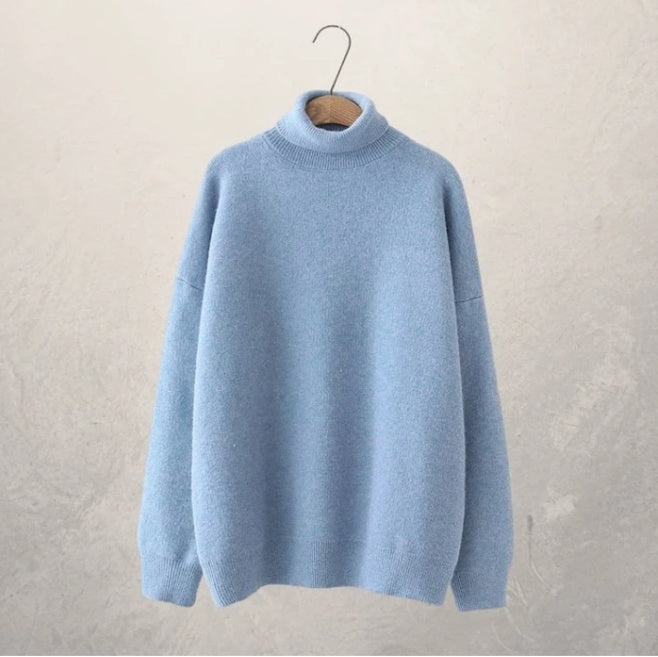 Autumn relaxed-fit turtleneck sweater in solid neutral tone with clean minimalist lines for everyday wear