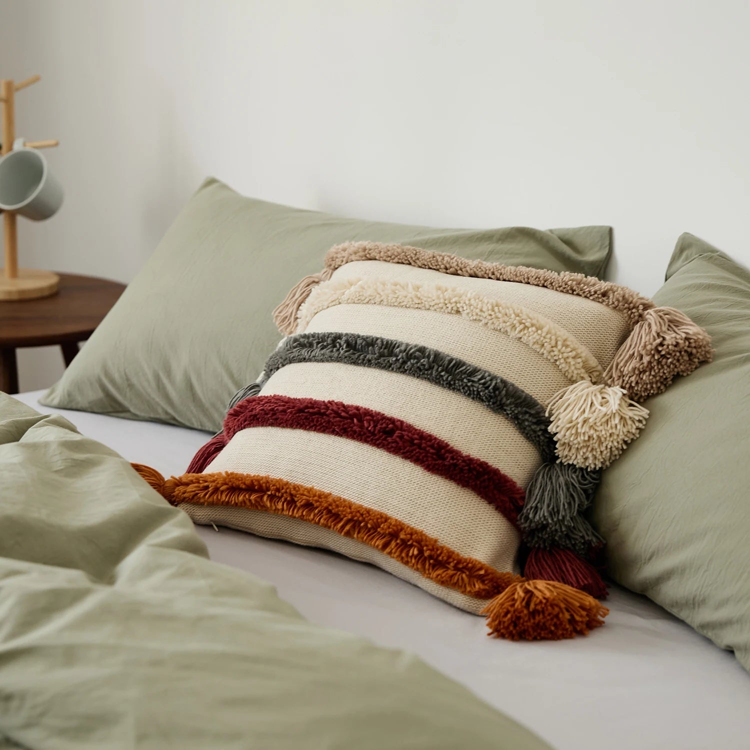 Boho tufted cushion cover with hand-tied tassels, bold pattern, perfect for sofa or bed decor