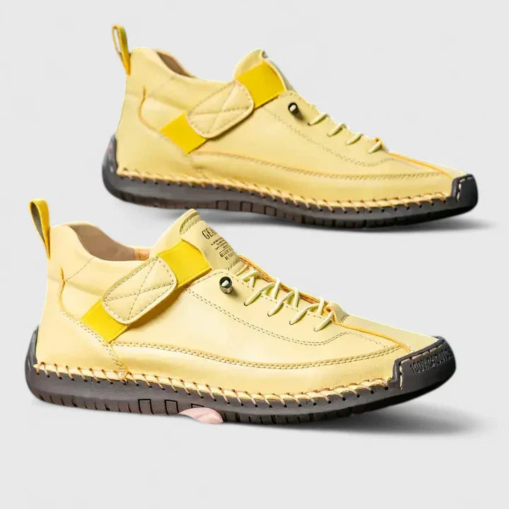 White high-top sneakers with stitched panels, lace-up front, and adjustable strap for urban daily wear