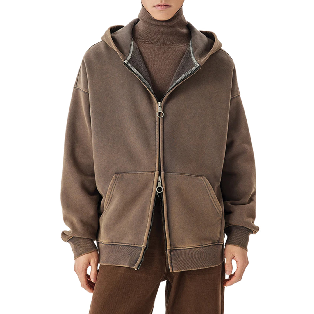 Oversized pigment-washed cotton hoodie in faded tones with double zipper streetwear style
