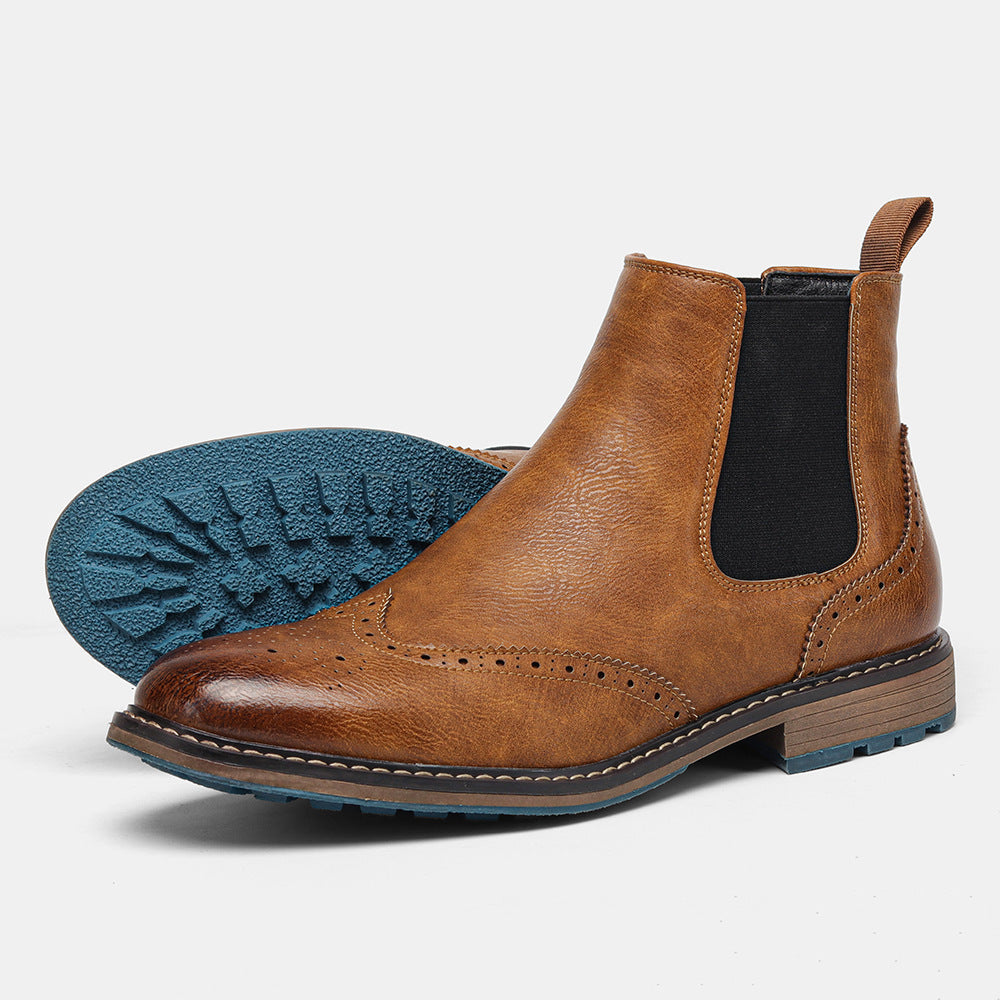 Men's brown leather Chelsea boots with brogue toe perforations, elastic sides, timeless everyday style