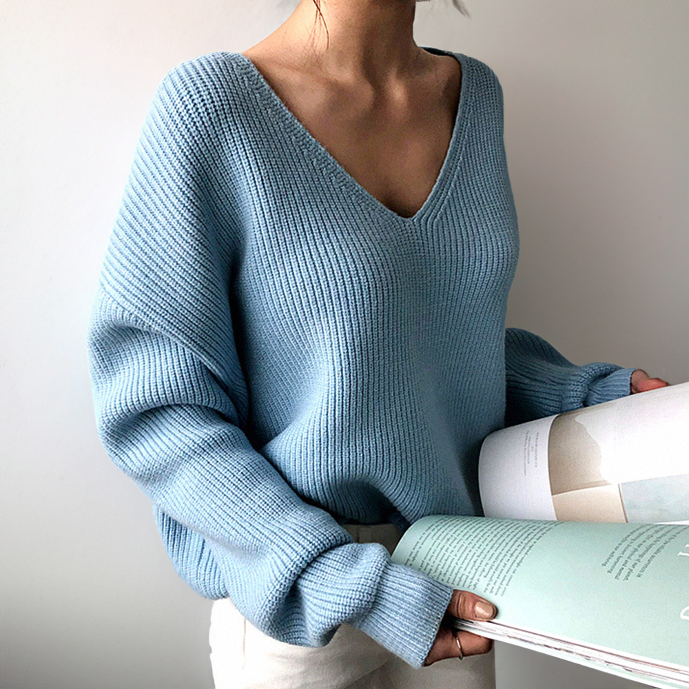 Women's chunky knit V-neck sweater in soft cozy yarn, relaxed pullover with elegant timeless style