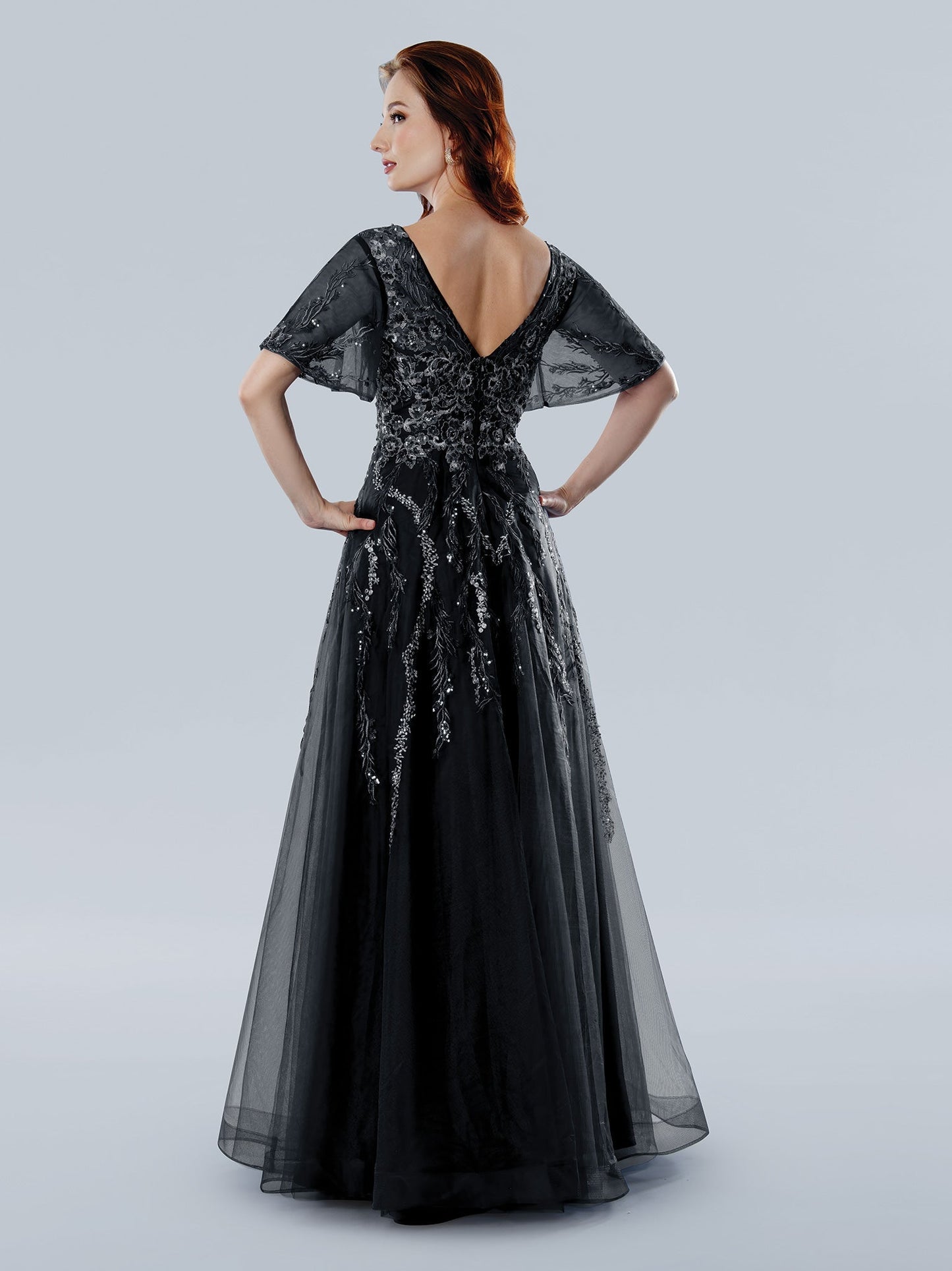 Stella Couture floral beaded tulle A-line mother of the bride gown with elegant cape sleeves