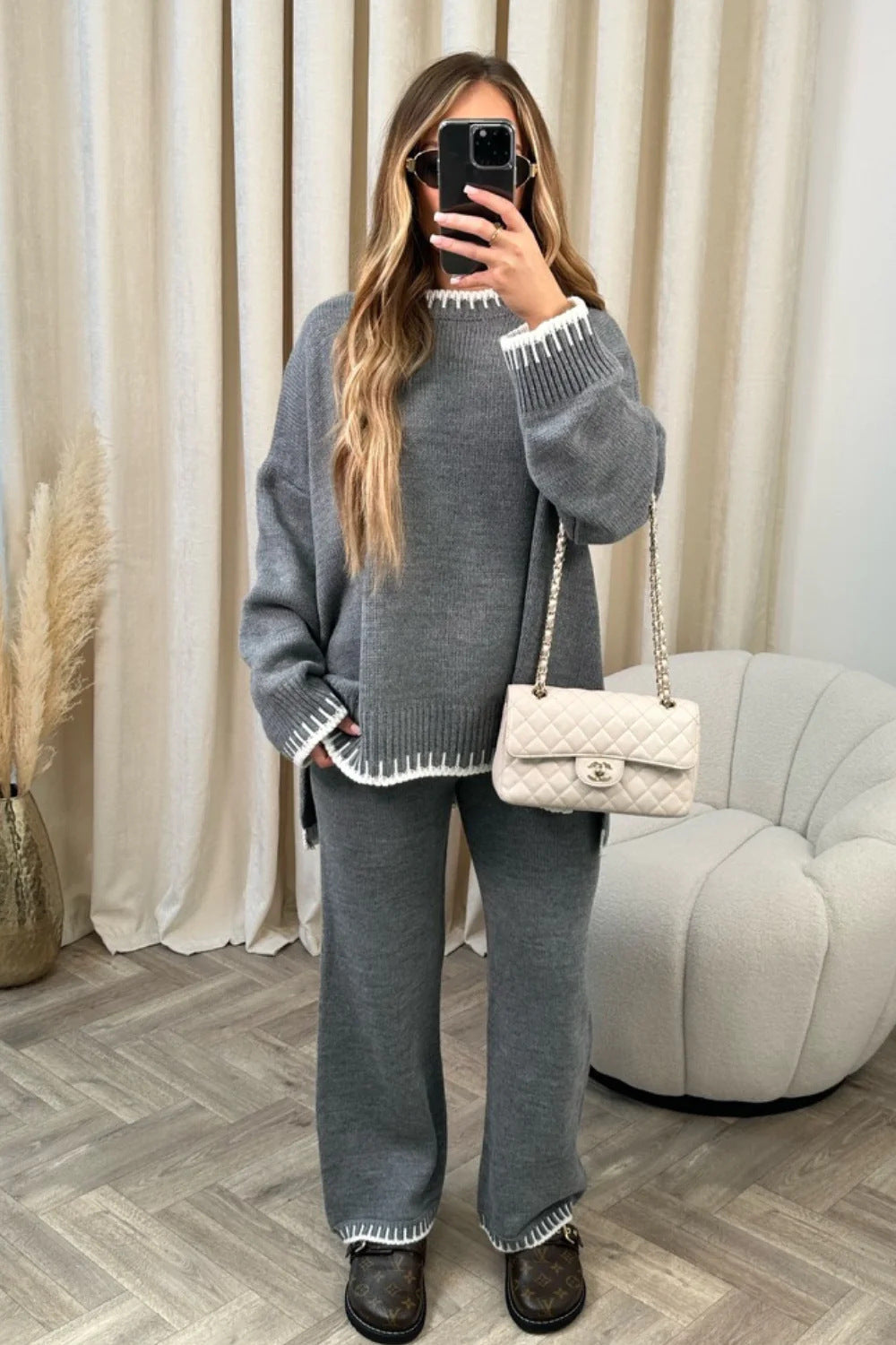 Women's knit two-piece sweater and pants set loose fit cozy lounge style coordinated casual outfit