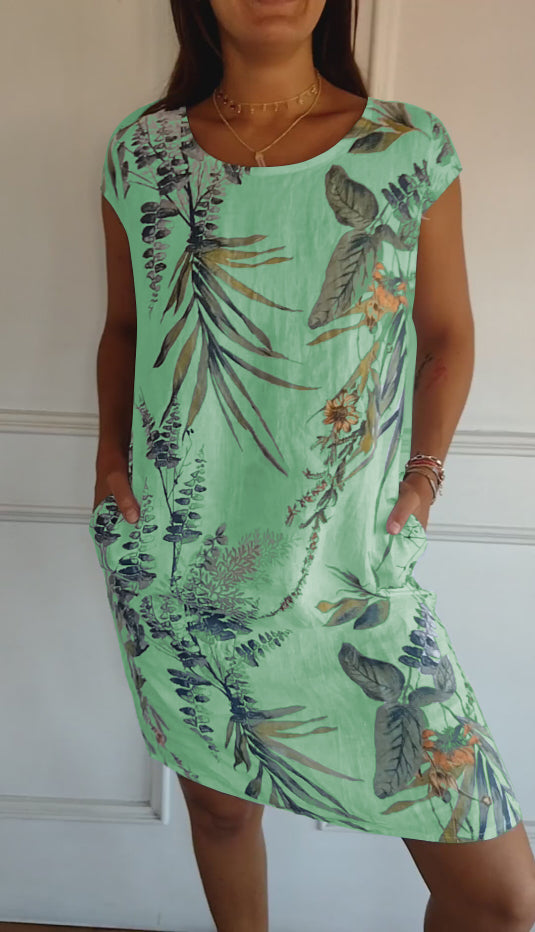 Women's relaxed fit short sleeve botanical print dress with side pockets for everyday summer comfort