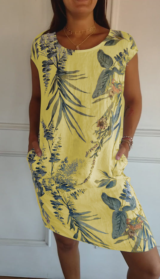 Women's relaxed-fit short sleeve botanical print dress with side pockets for everyday summer comfort