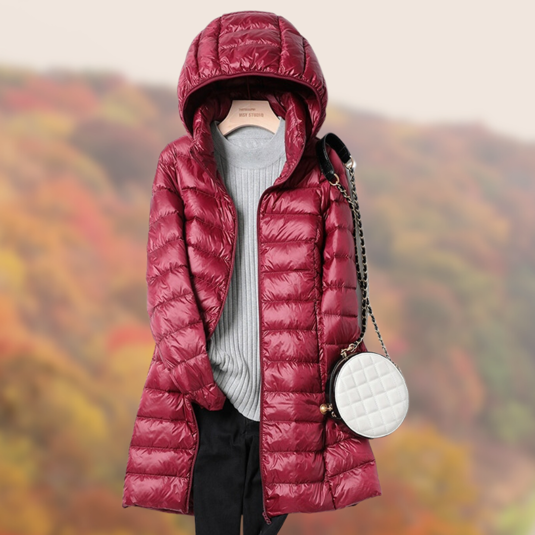 Lauren women's long hooded zip-up puffer jacket, sleek longline silhouette for cold weather city wear
