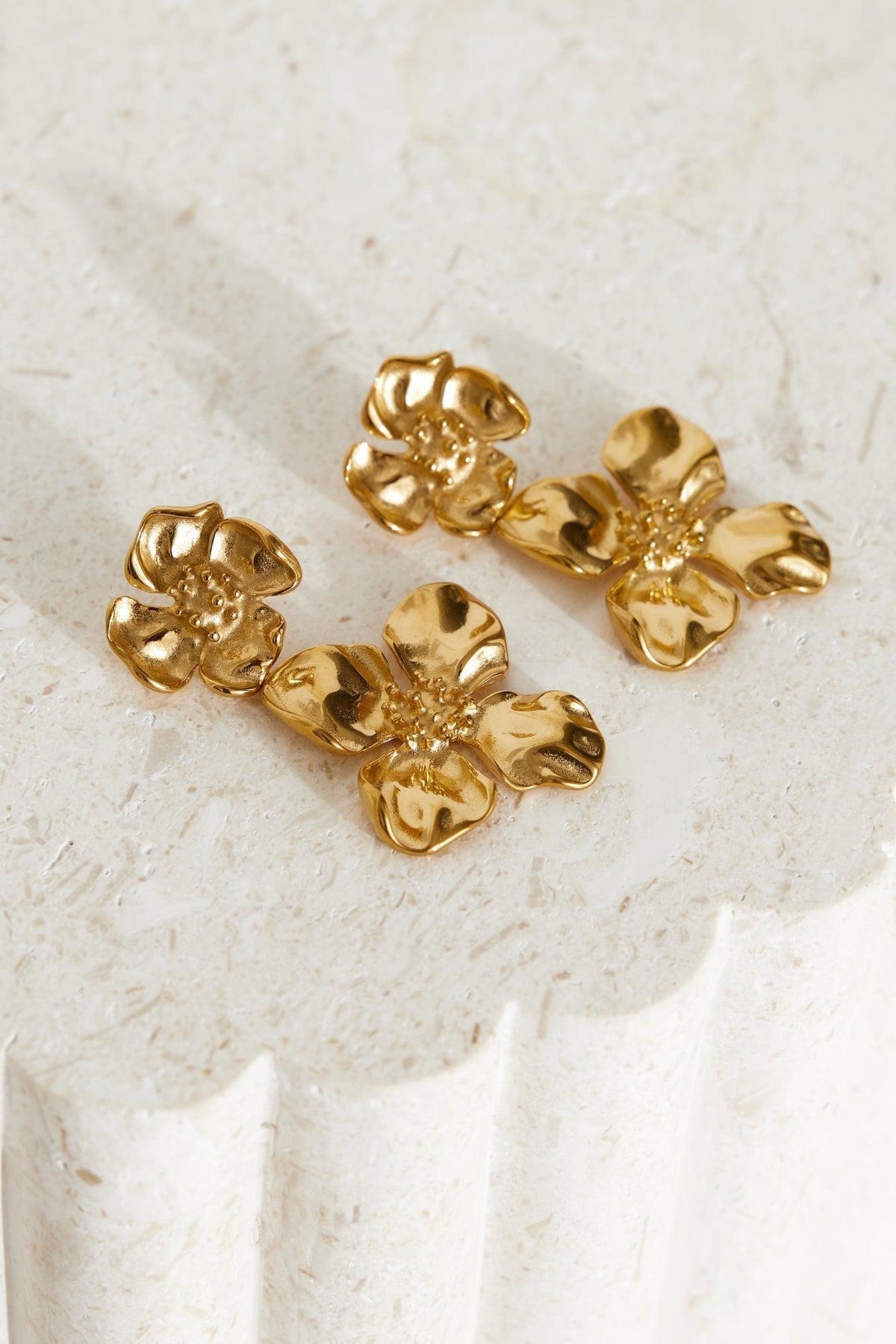 18K gold plated flower dangle earrings with stud closures, polished finish, nature-inspired floral motif