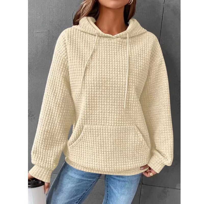Women's loose-fit hoodie with kangaroo pocket in soft textured fabric for casual everyday comfort
