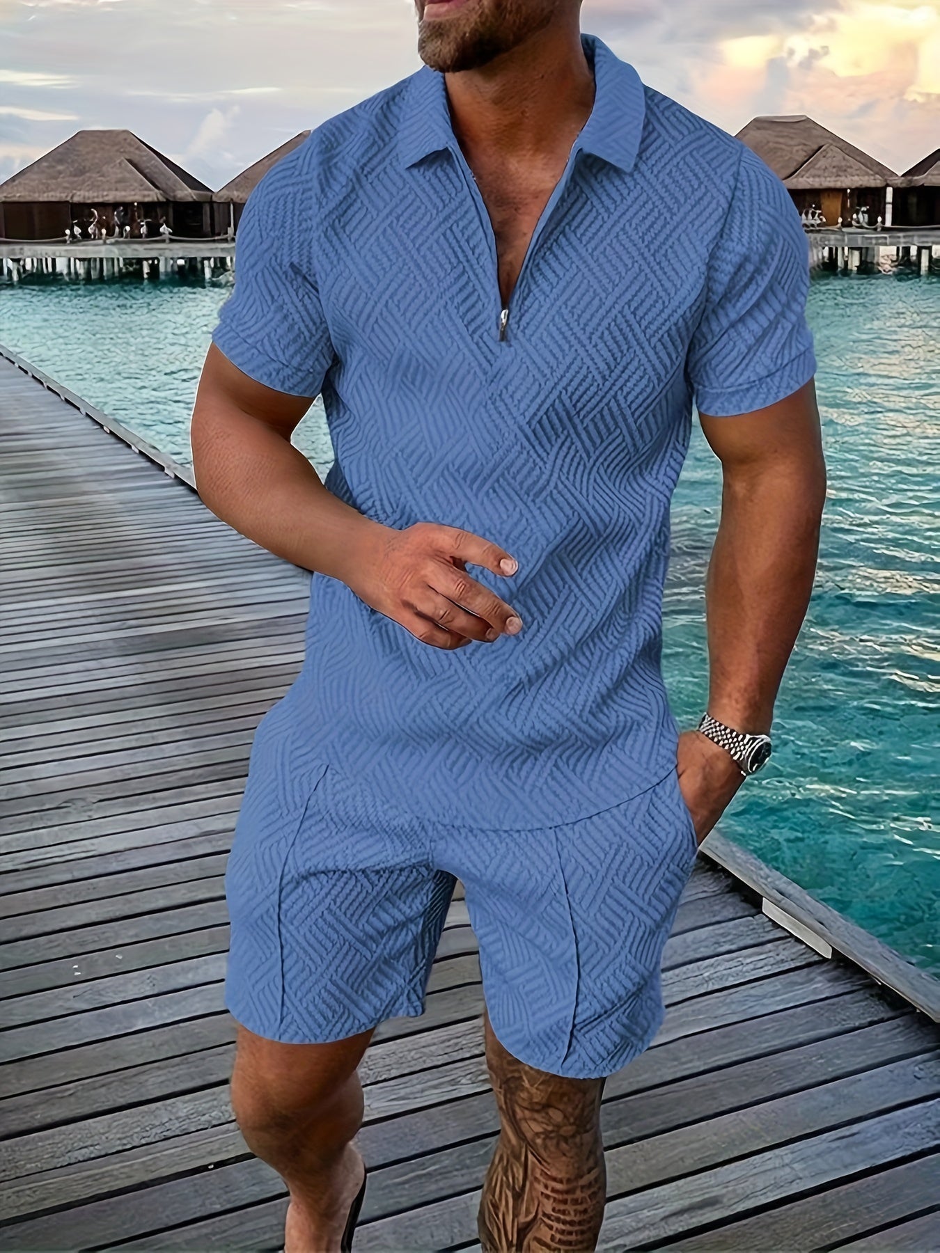 Men's geometric print cotton blend romper with short sleeves and front zipper closure