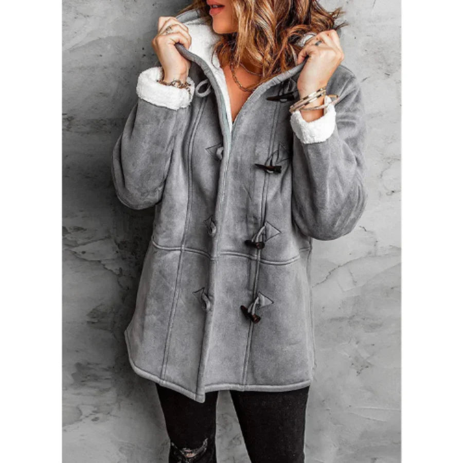 Women's mid-length fleece-lined relaxed fit jacket with hood and toggle closure