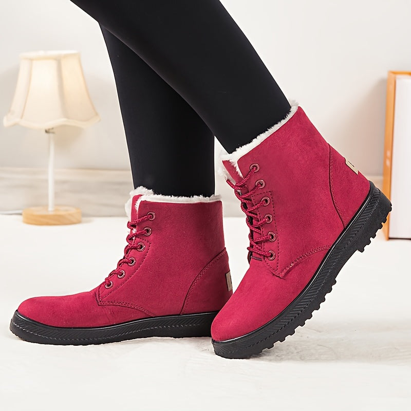 Women's ankle-high winter boots with lace closure, fleece lining, and profiled sole for cold weather