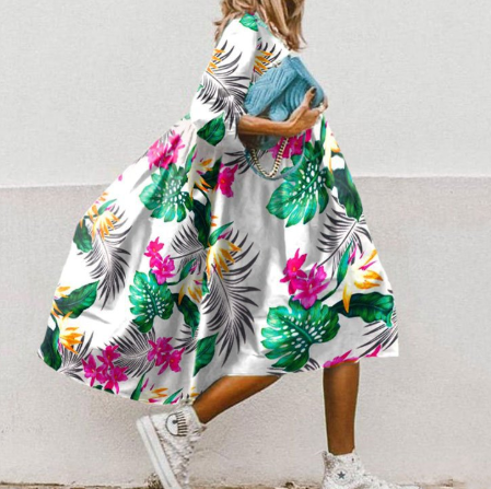 Women's flowing floral dress elegant silhouette puff three-quarter sleeves sunny chic casual style