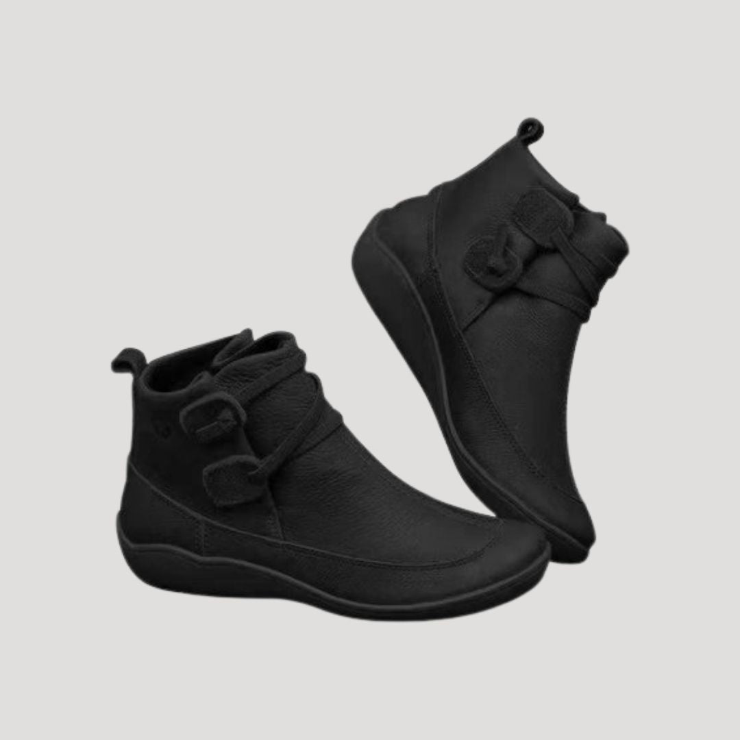 Women's casual spring ankle strap boots in neutral tone with secure buckle strap and everyday comfort fit
