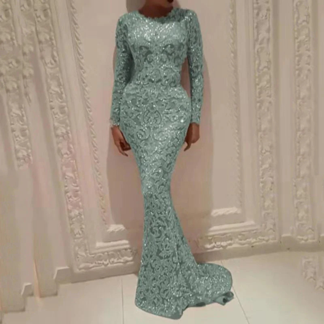 Women's silver sequin mermaid maxi dress with long sleeves and curve-hugging fitted silhouette