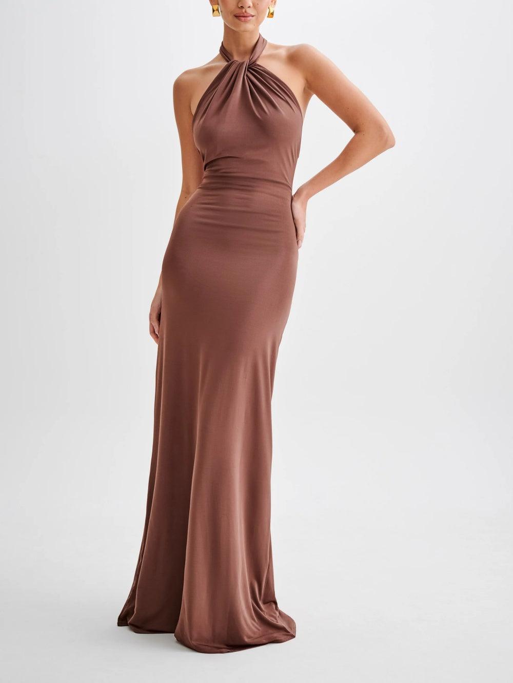 Black halterneck evening gown with softly gathered bodice, sculpted silhouette for elegant formalwear