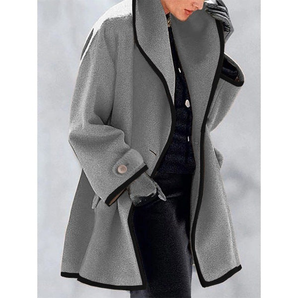 Women's loose fit elegant coat with bold contrast piping trim, wide collar, contemporary silhouette