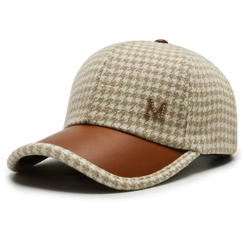 Black white houndstooth cap with premium leather accents and gold monogram adjustable fit