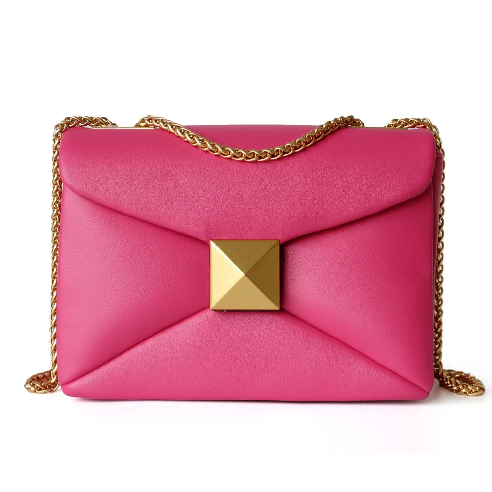 Valencia genuine leather handbag spacious tote with gold rivet chain detail for women