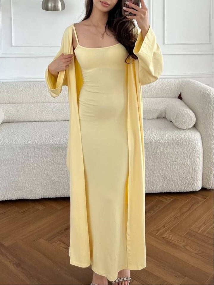 Women's sleeveless suspender hip dress two-piece set with long cardigan, chic celebrity casual style